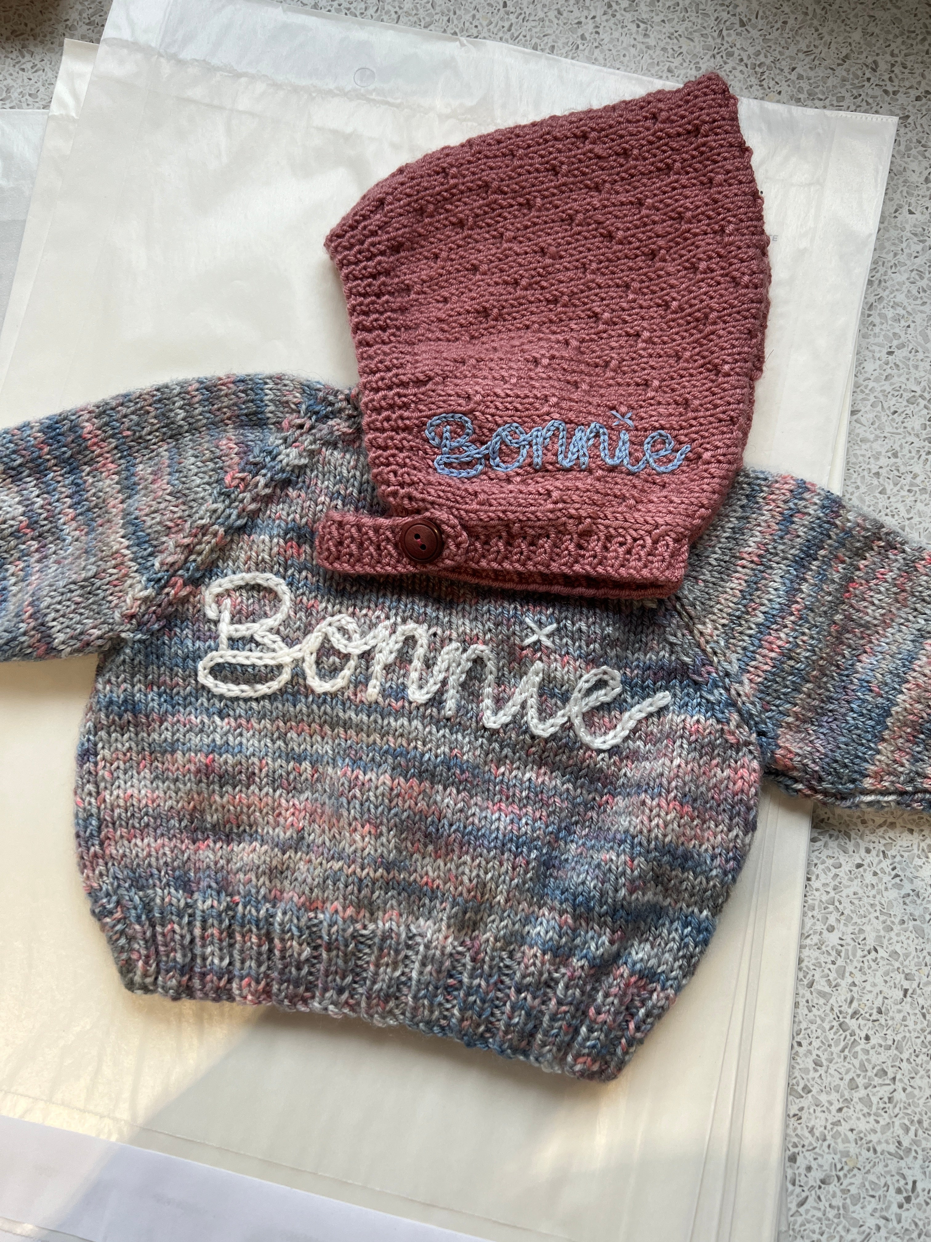 0-9 months hand knitted bonnet | name embroidery